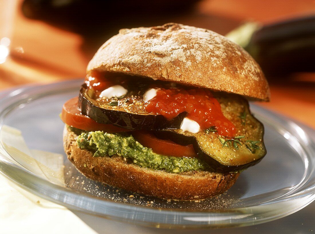 Vegetable burger with aubergines, tomatoes & herb paste