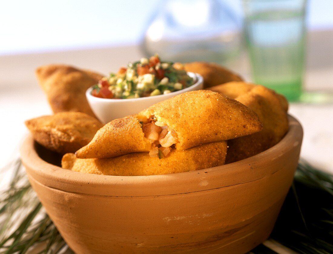 Shrimp empanadas with avocado salsa