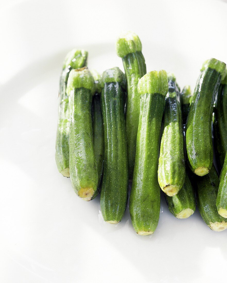 Baby courgettes on plate