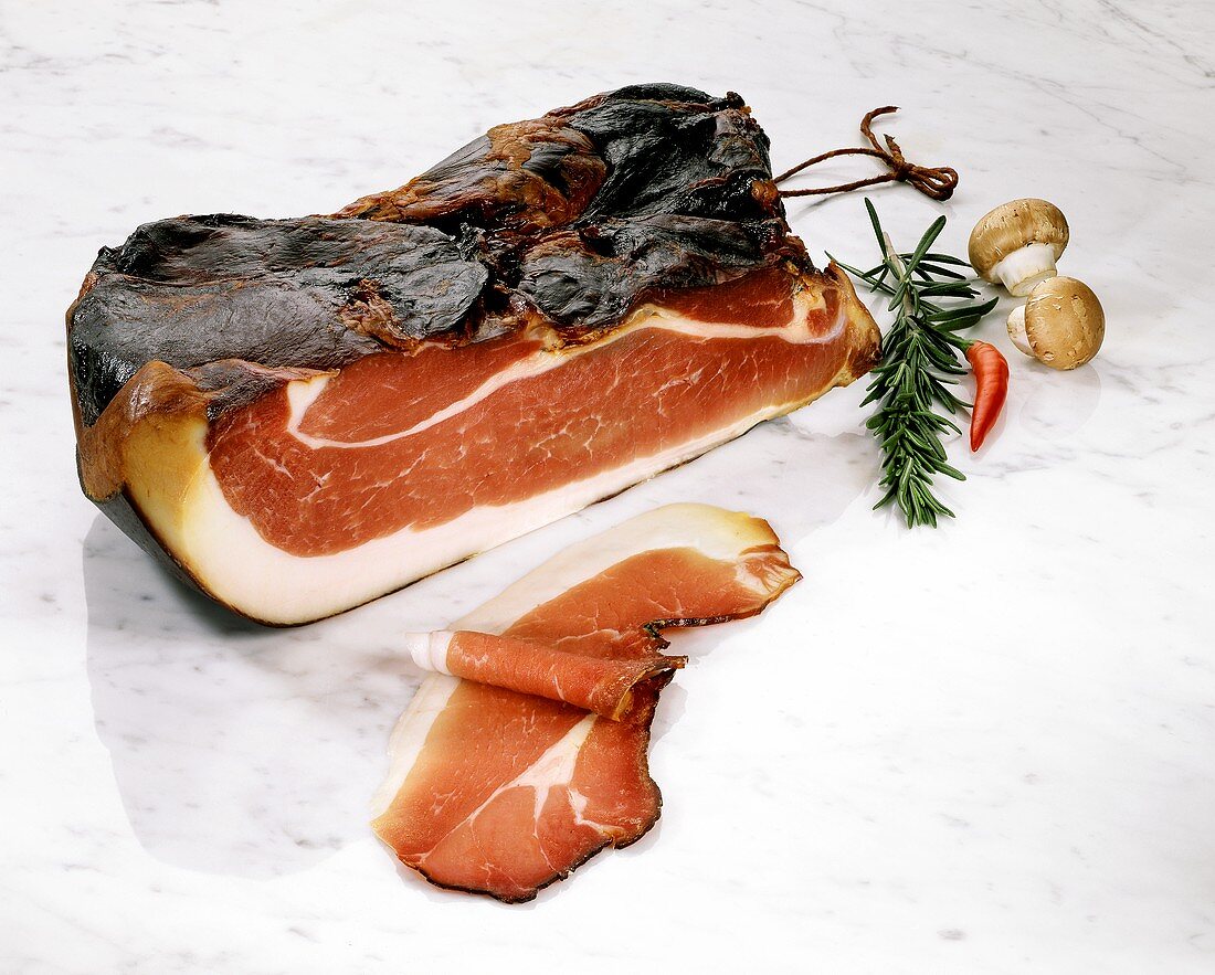 Schinkenspeck, rosemary, mushrooms and chili