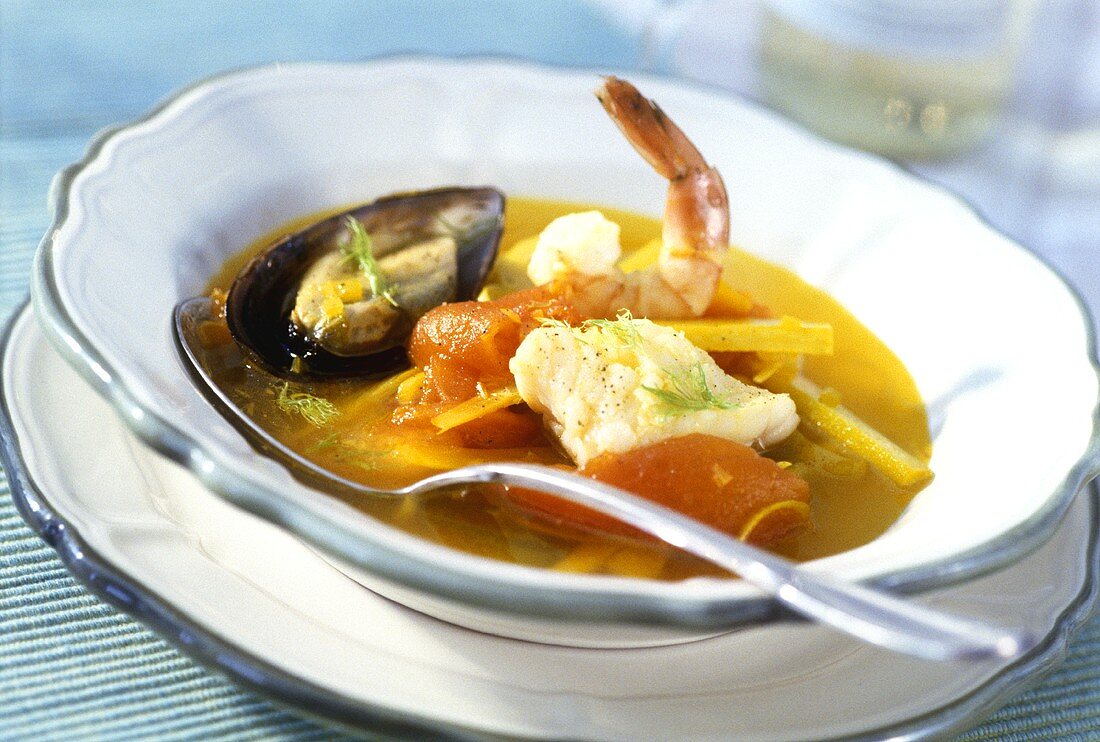 Fish soup with mussels, shrimps and tomatoes