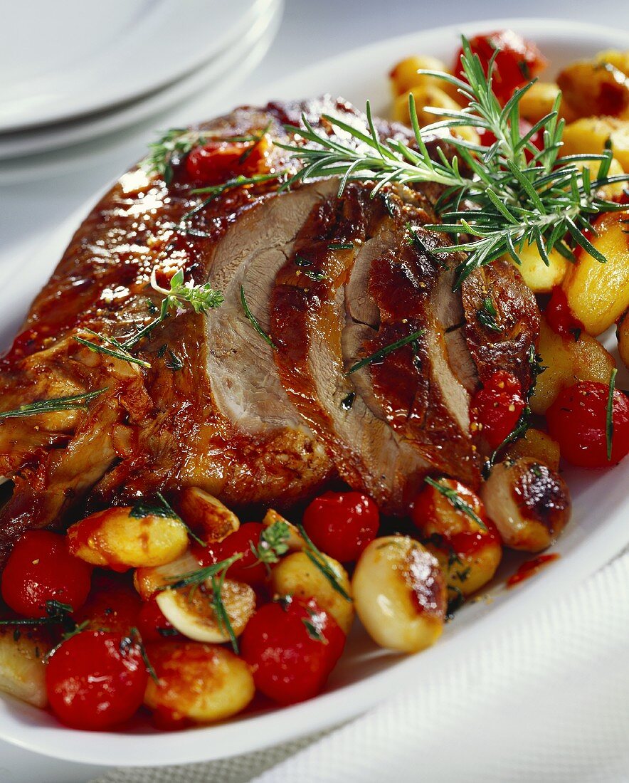 Roast leg of lamb with rosemary and shallots