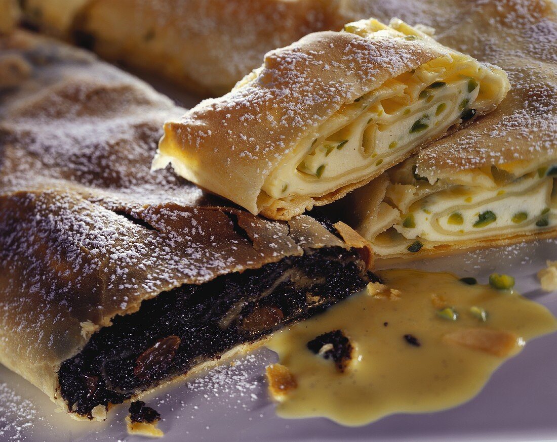 Poppy seed and curd cheese strudel with icing sugar