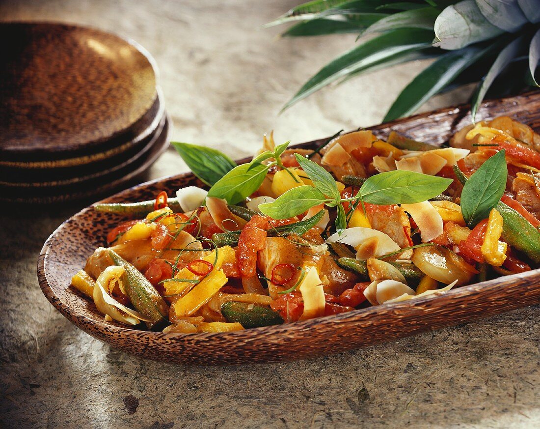 Curried pork fillet with pineapple and okra pods