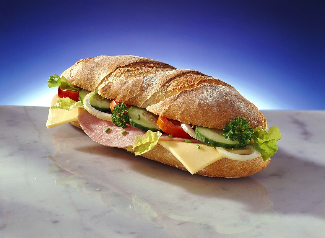 Baguette with ham, cheese, tomato and cucumber