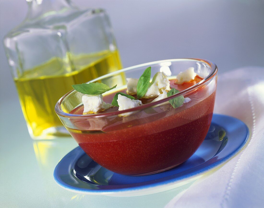 Tomato jelly with sheep's cheese and basil; olive oil
