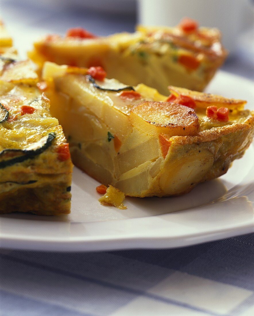 Vegetable tortilla, cut into pieces