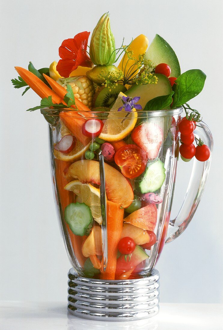Fresh fruit and vegetables in blender