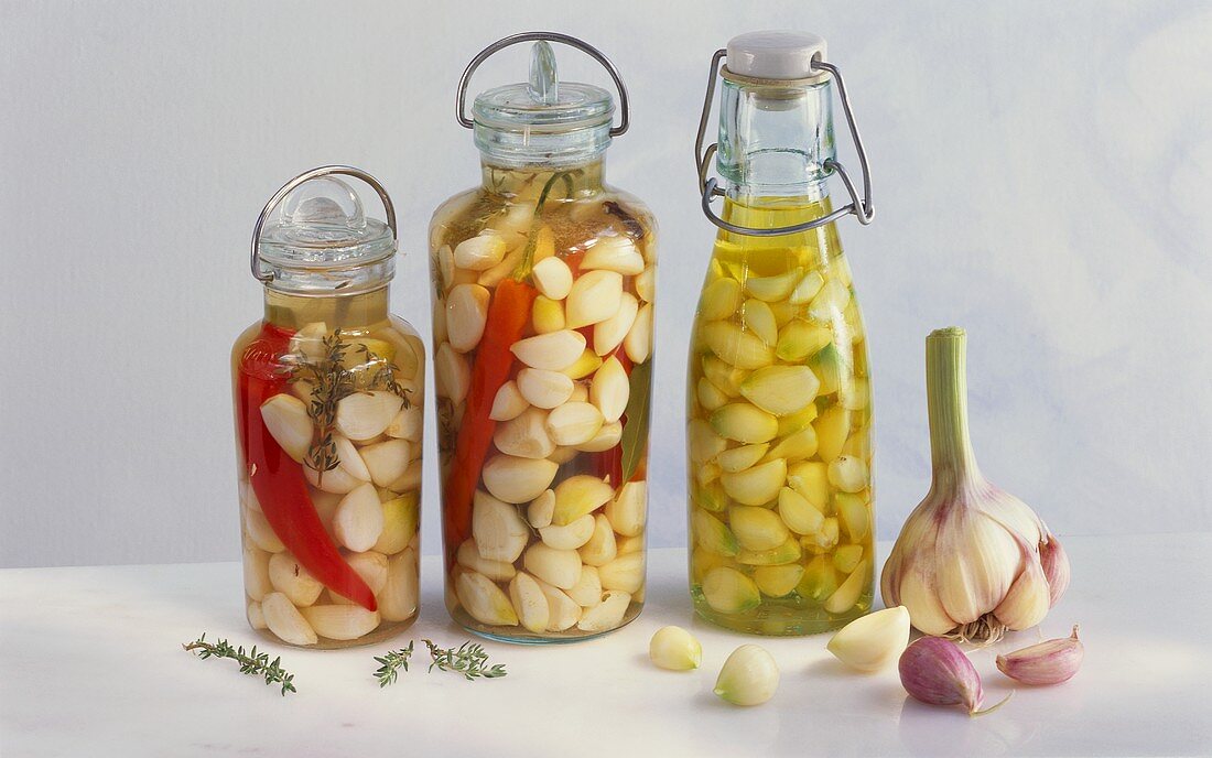 Pickled garlic in three jars