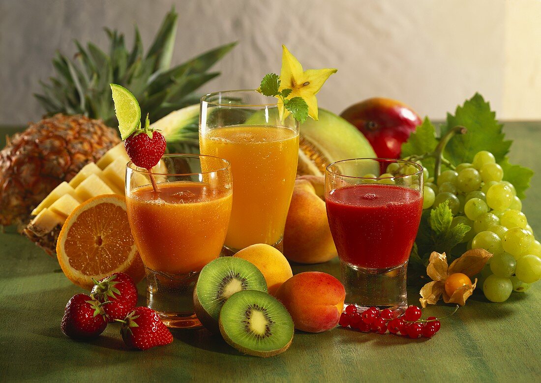 Various fruit juices and fresh fruit