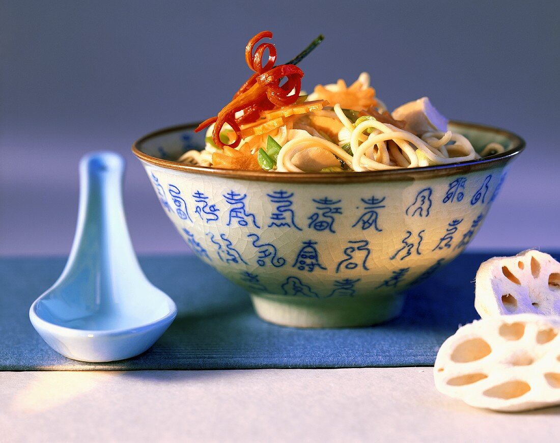 Egg noodles with chicken and lotus roots