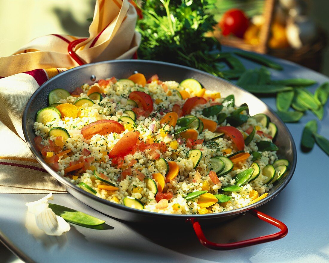 Bulgur wheat with tomatoes, carrots and courgettes