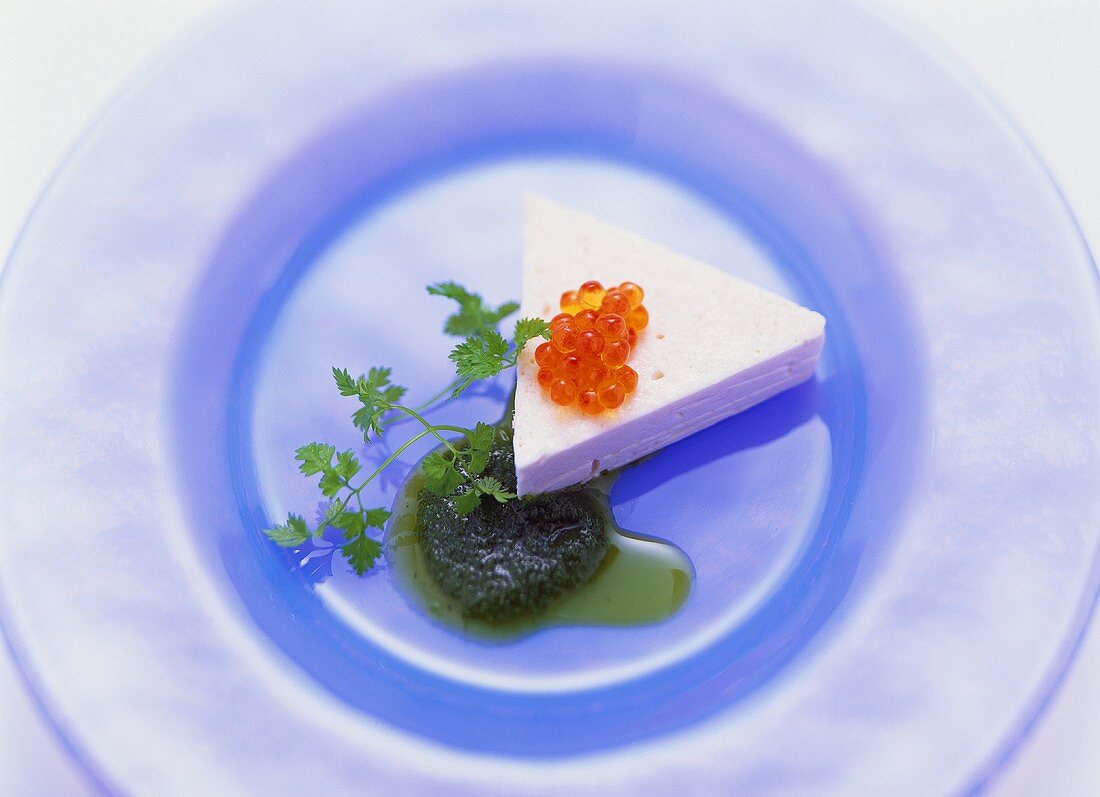 Salmon mousse with herb oil and trout caviare