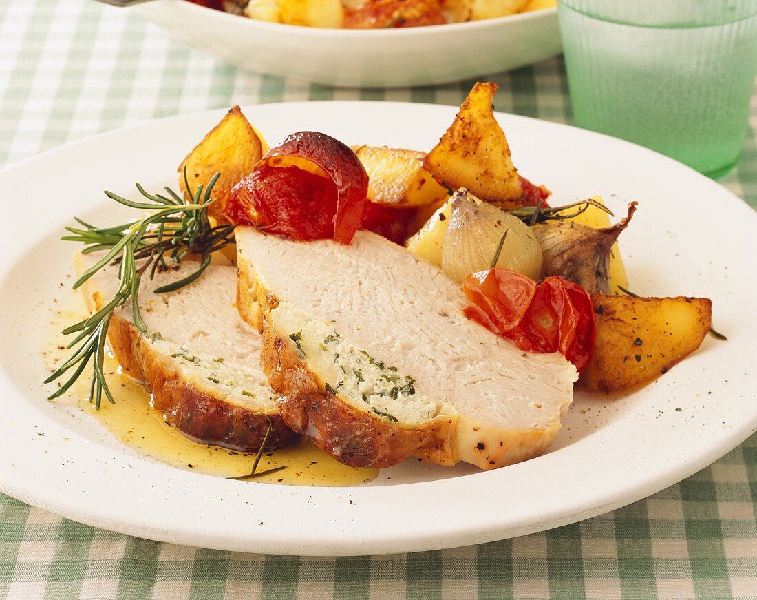 Stuffed turkey breast with roasted vegetables