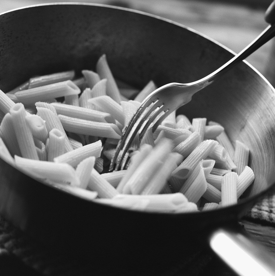 Cooked penne in a dish