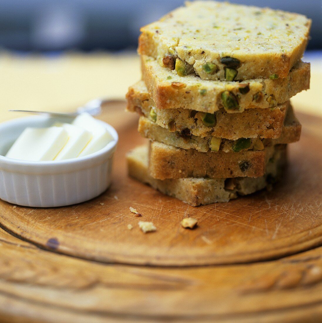 Slices of pistachio bread with butter