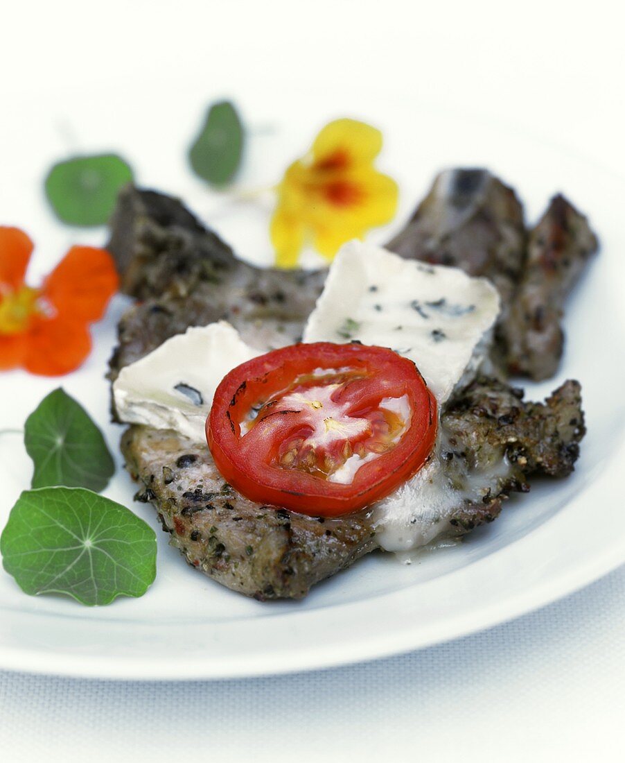 Pork chop with blue cheese and nasturtiums