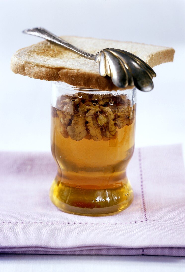 Honey with walnuts and toast