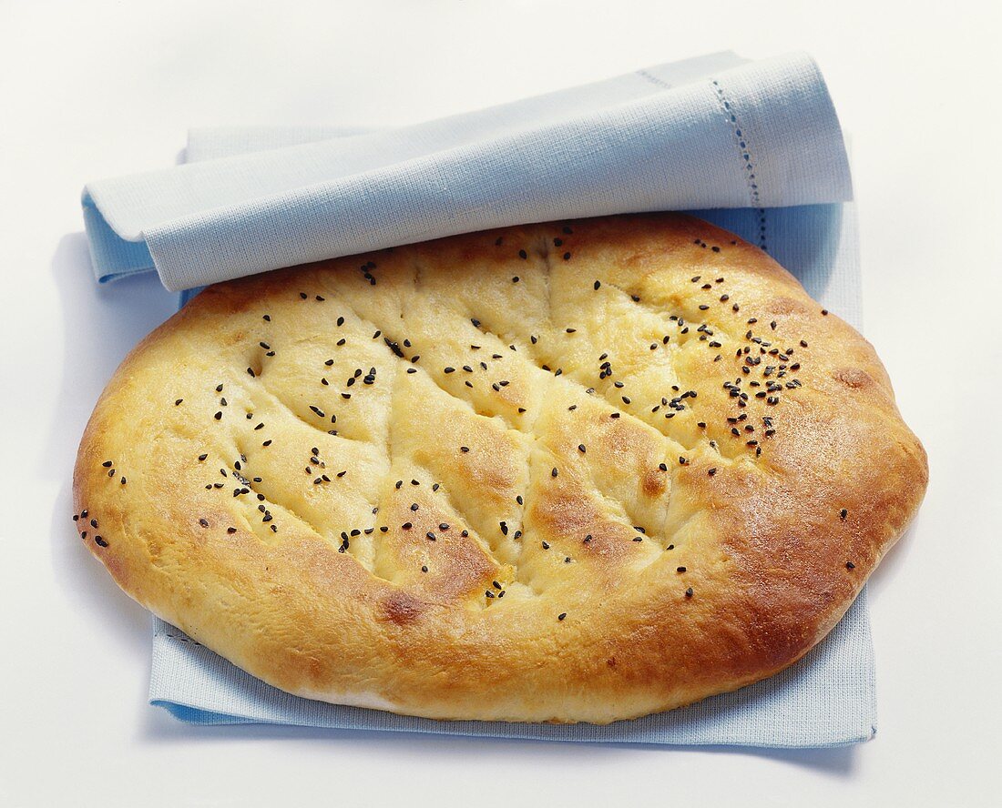 Turkish flatbread in blue napkin