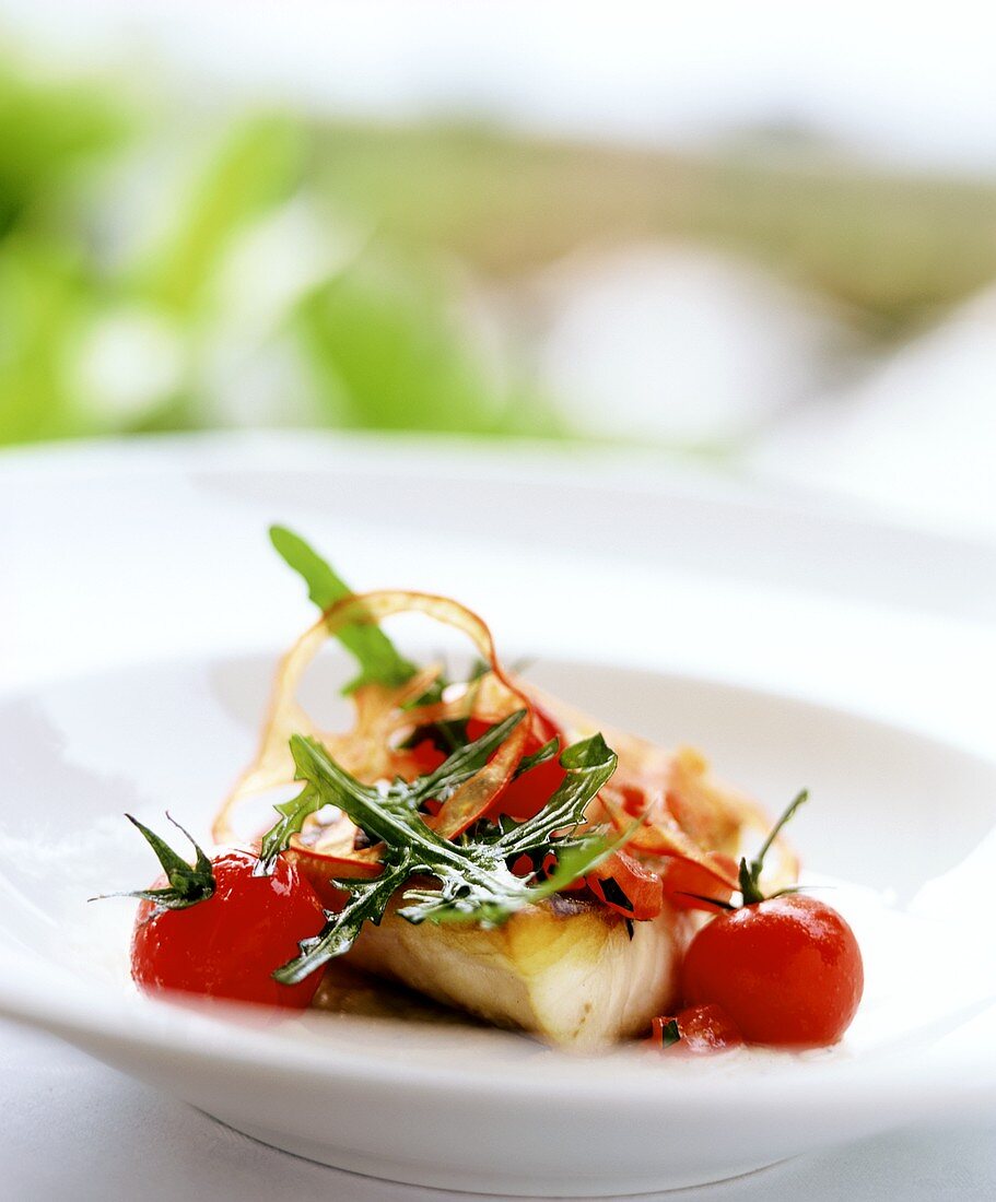 Sea bass with cherry tomatoes and rocket