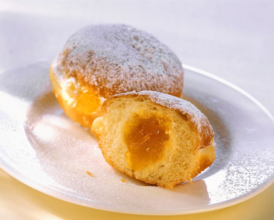 Small doughnuts with apricot jam