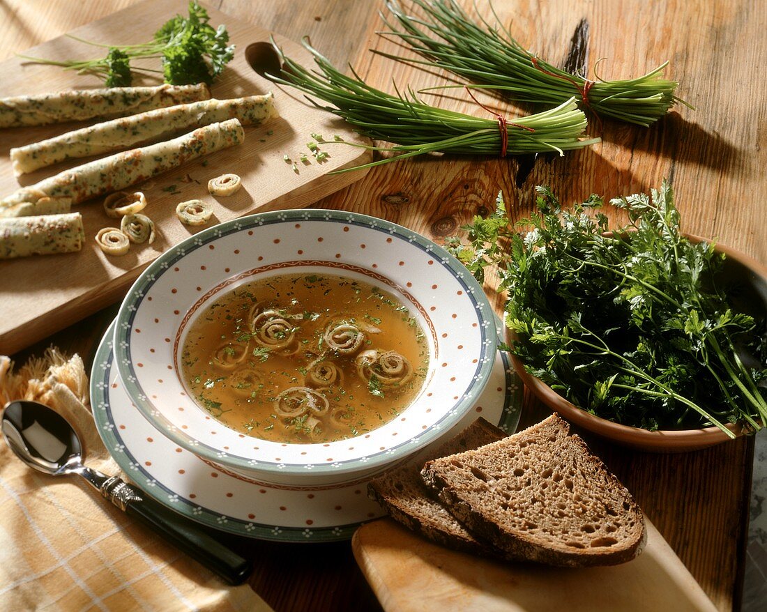 Herb pancake soup with bread