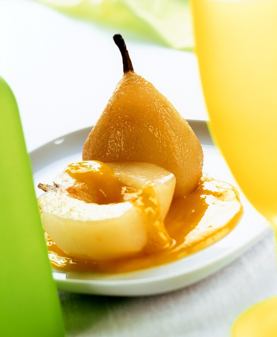 Poached pear with mango sauce