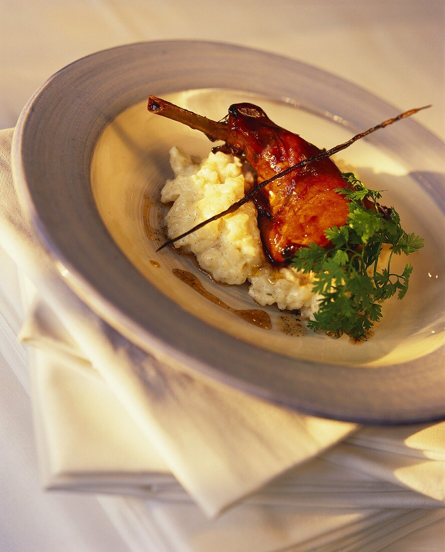 Rabbit leg on vanilla risotto