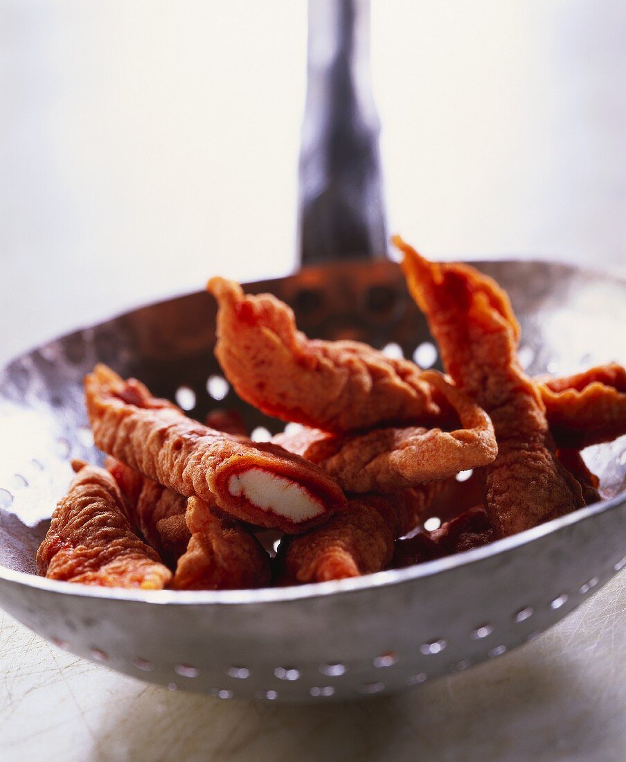 Tandoori chicken beignets on ladle