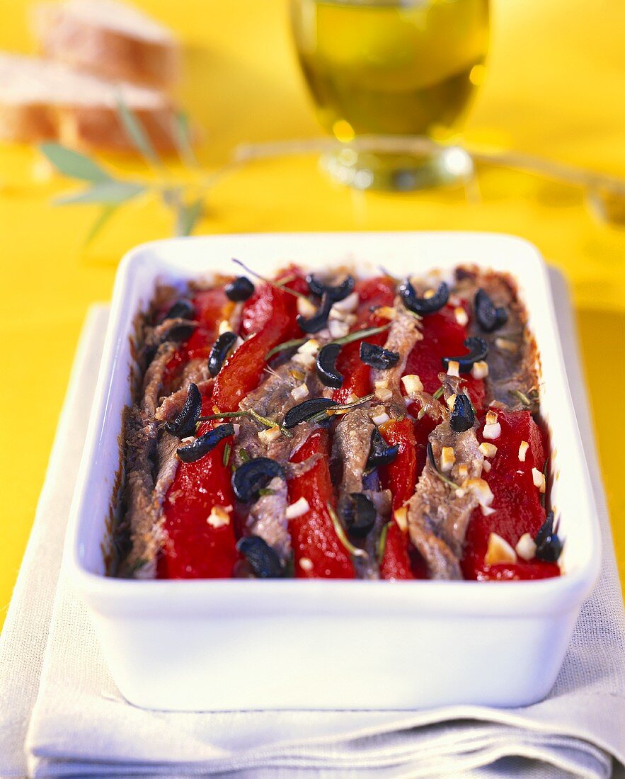 Baked peppers with anchovies and olives