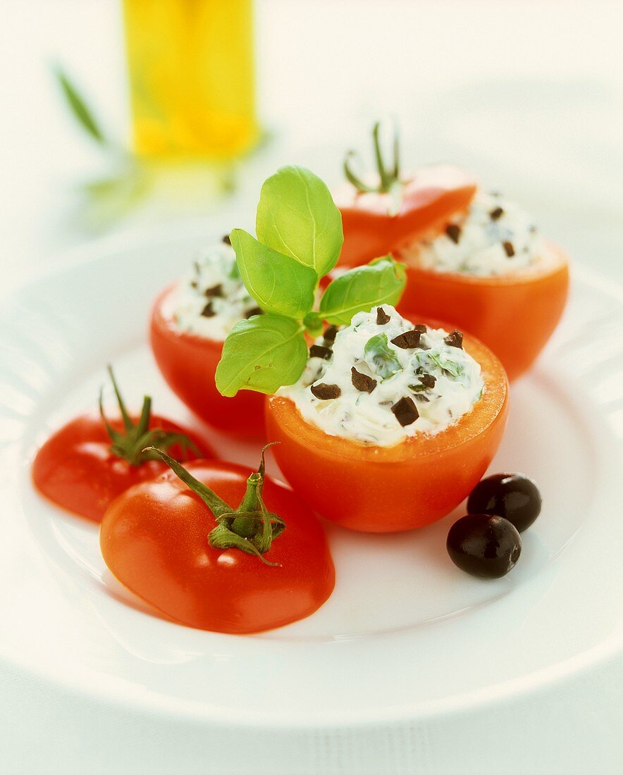 Tomatoes stuffed with olive cheese