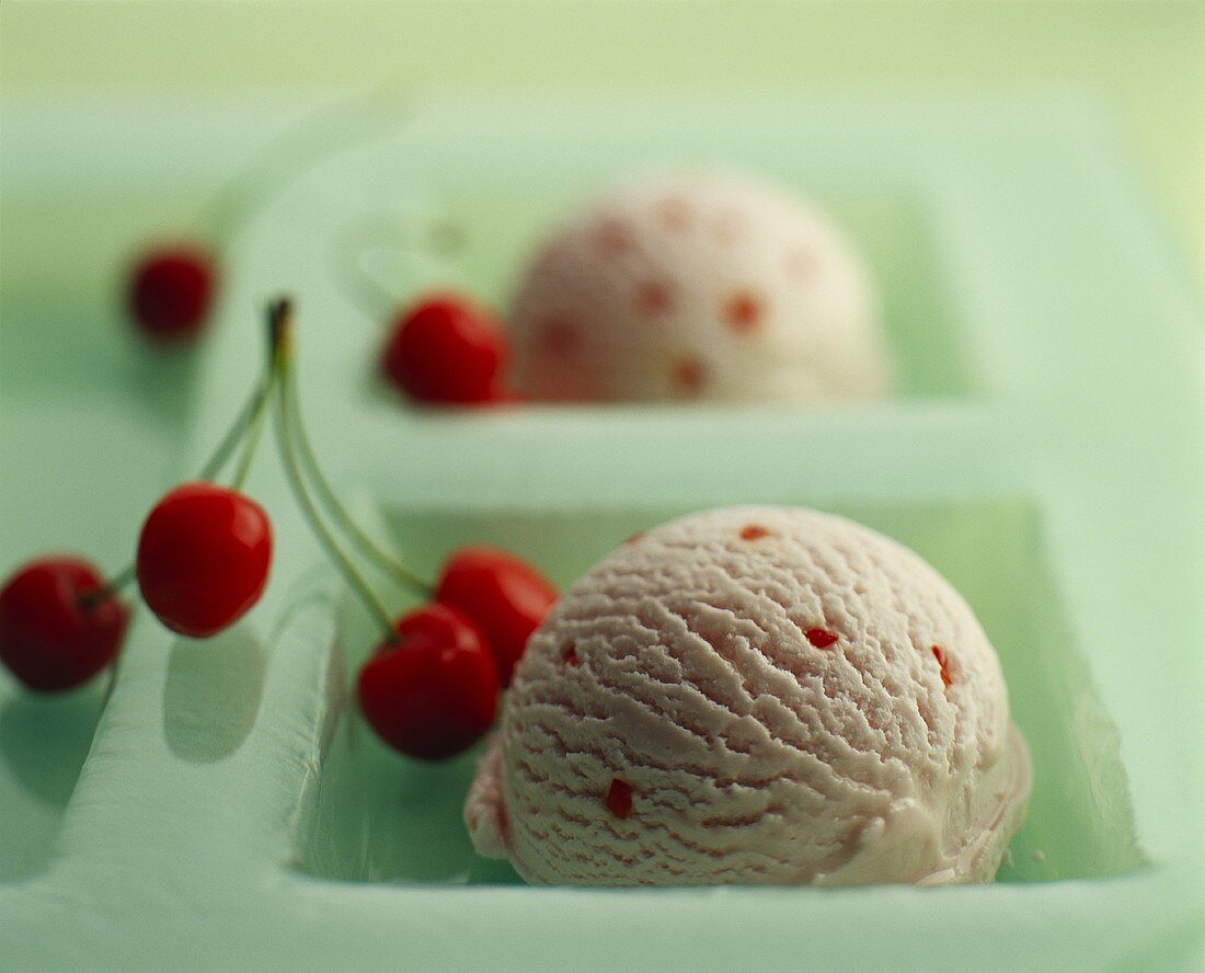 Cherry ice cream and fresh cherries