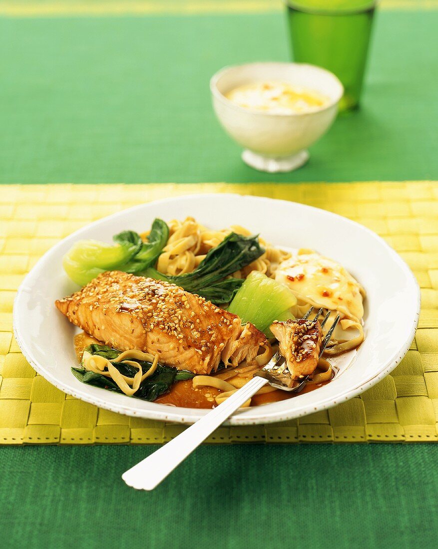 Salmon with sesame, pak choi and ribbon pasta