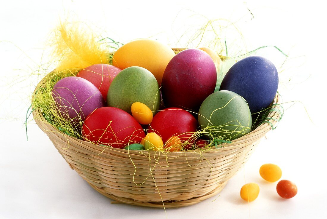 Coloured Easter eggs in basket