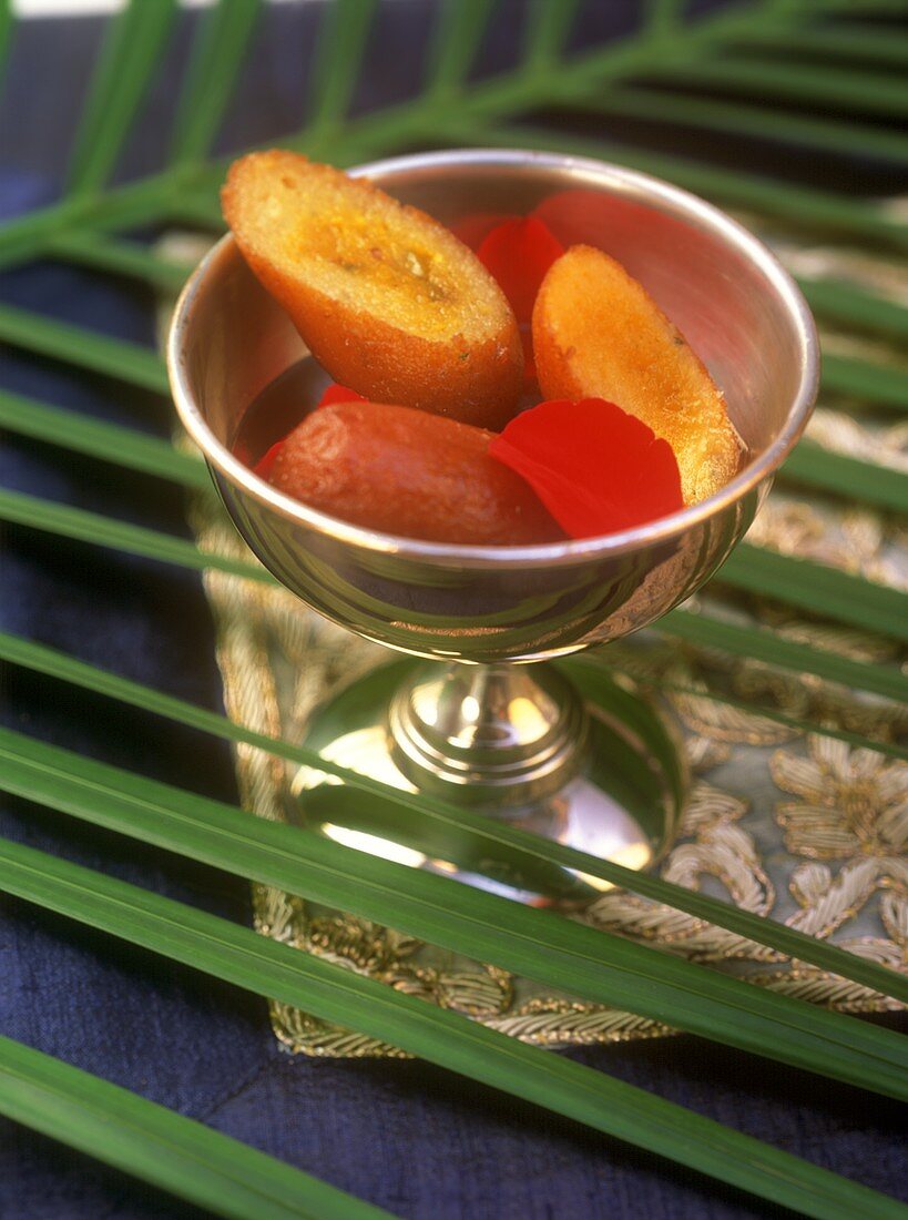 Gulab jamun (fried milk balls in sugar syrup, India)