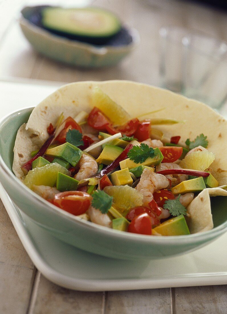 Tortilla with shrimp and avocado salad