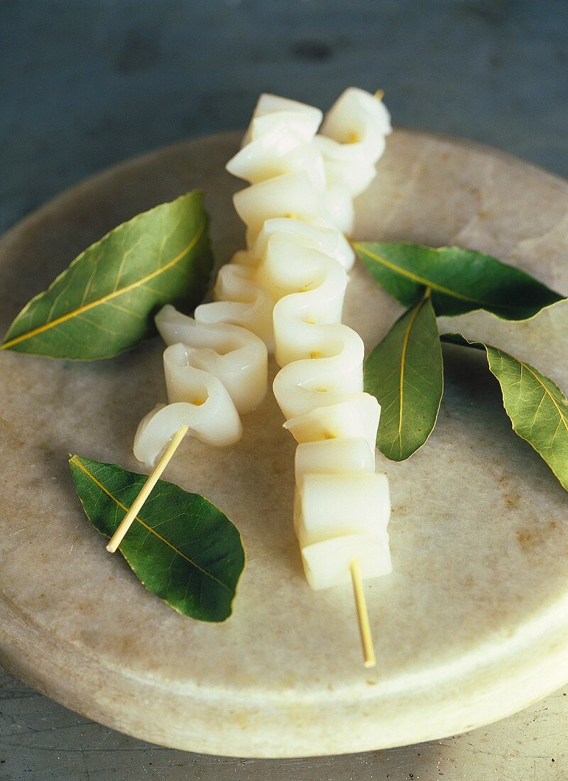 Squid kebabs; bay leaves