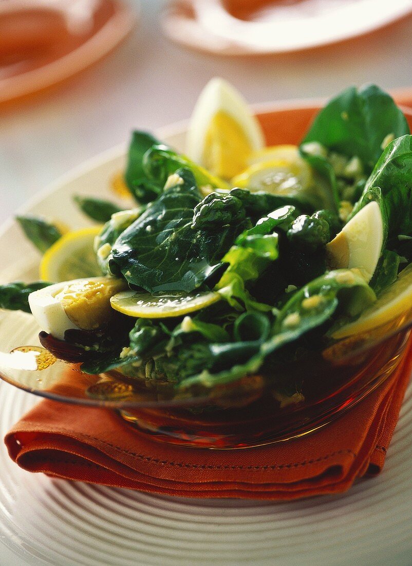 Chicory salad with green asparagus, egg and lemon