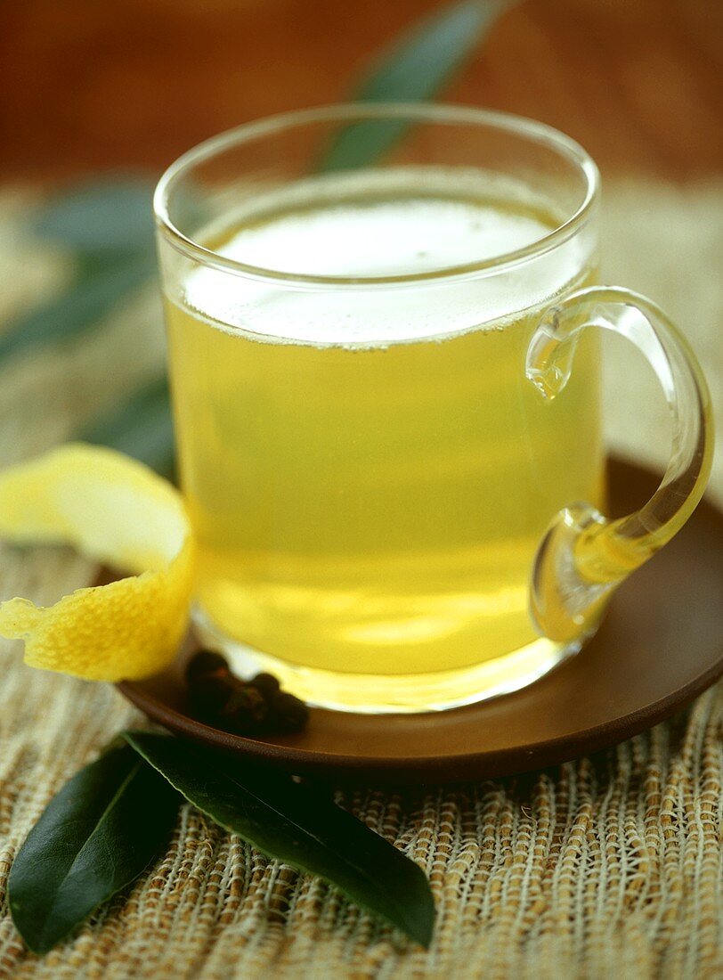 Hot pear tea with lemon peel