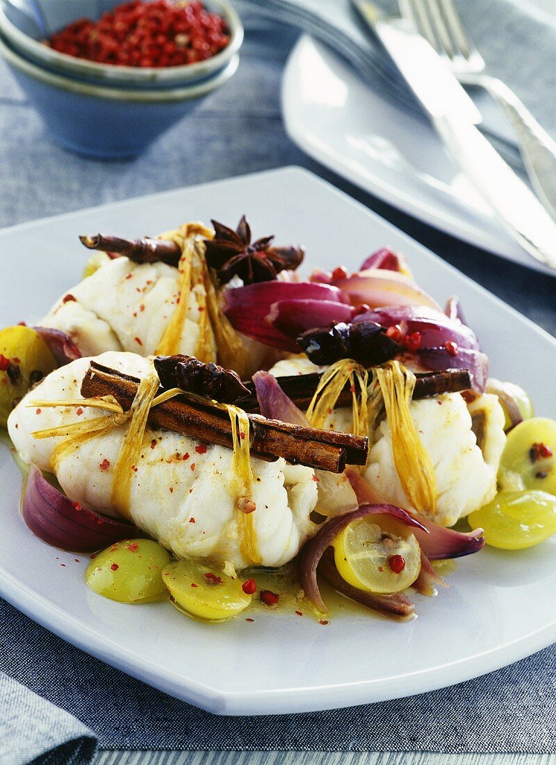 Fish with spices and grapes