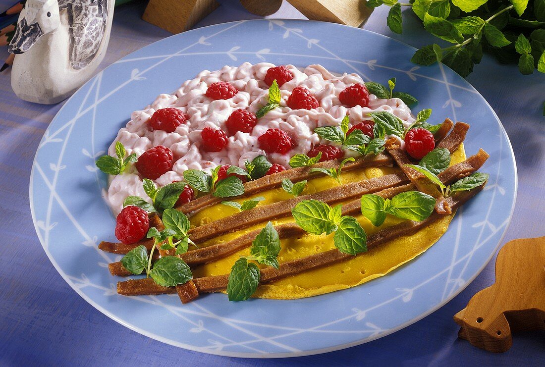 Pancake basket with raspberry cream for children