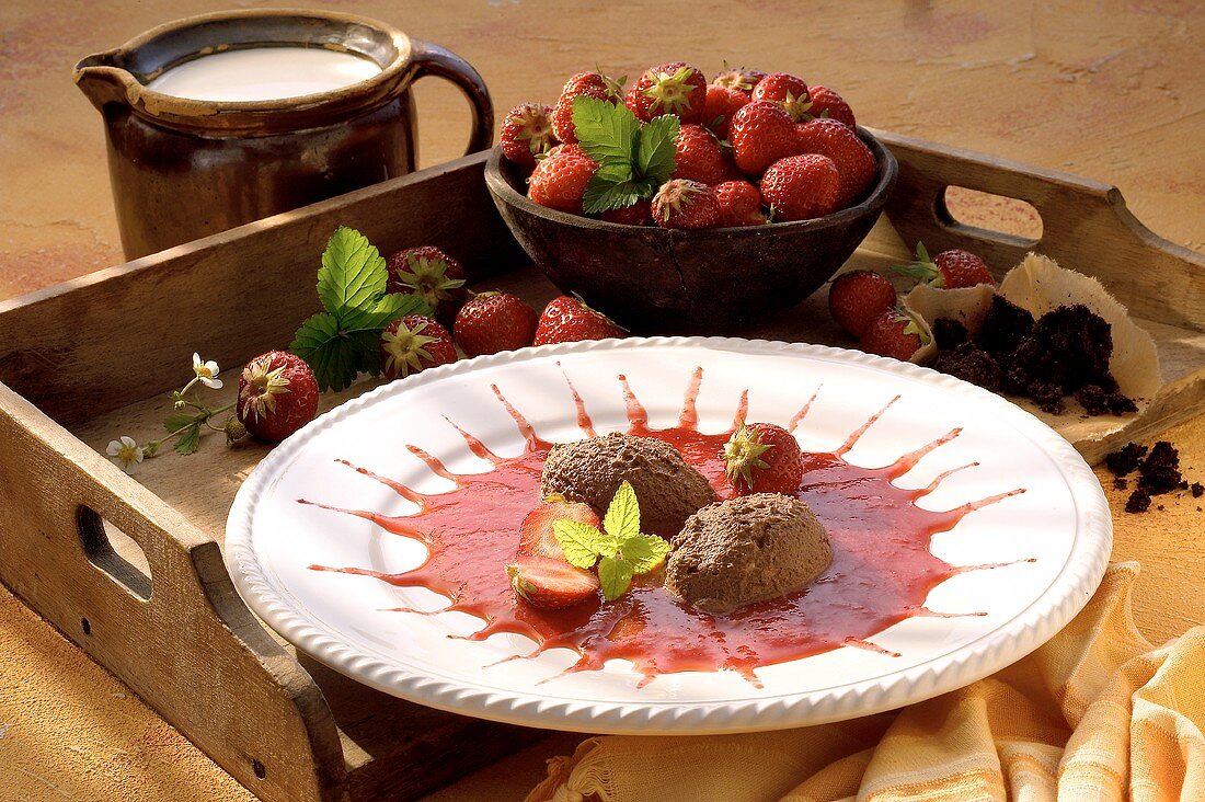 Mousse au chocolat with strawberry puree
