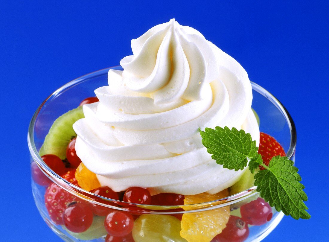 Fruit salad with whipped cream