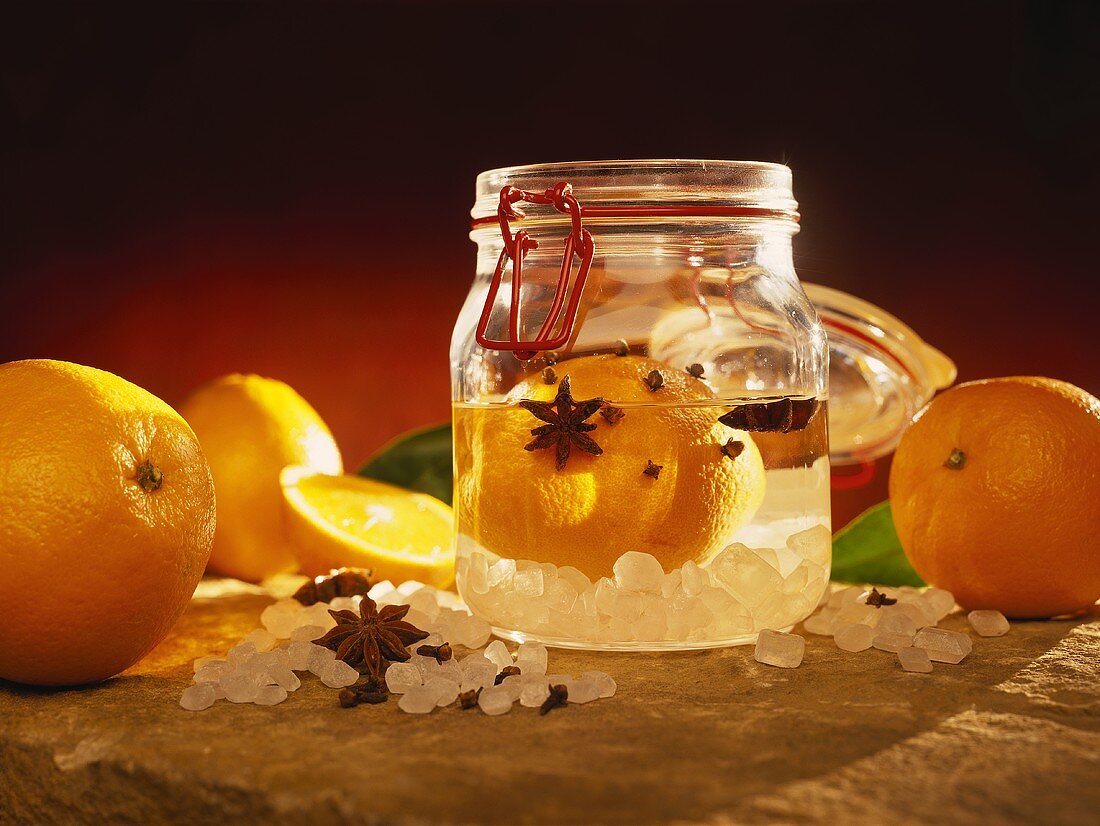 Home-made orange liqueur with sugar crystals