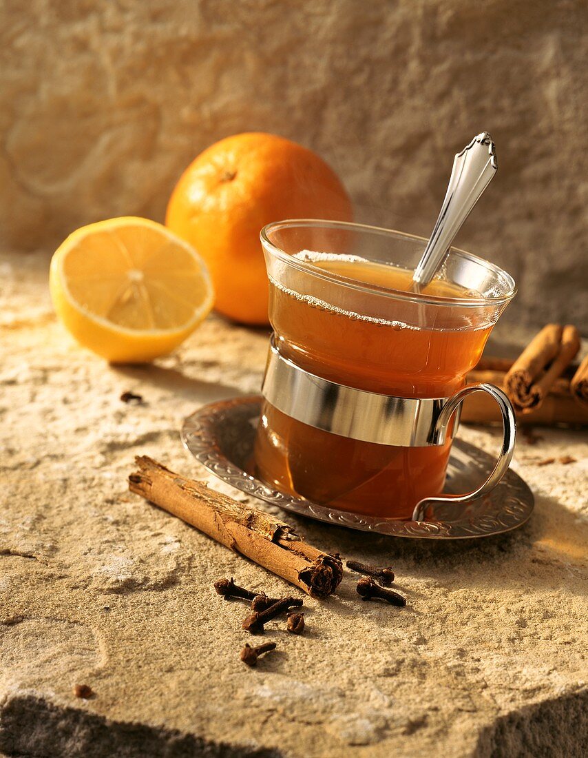 Tea punch with orange and cinnamon