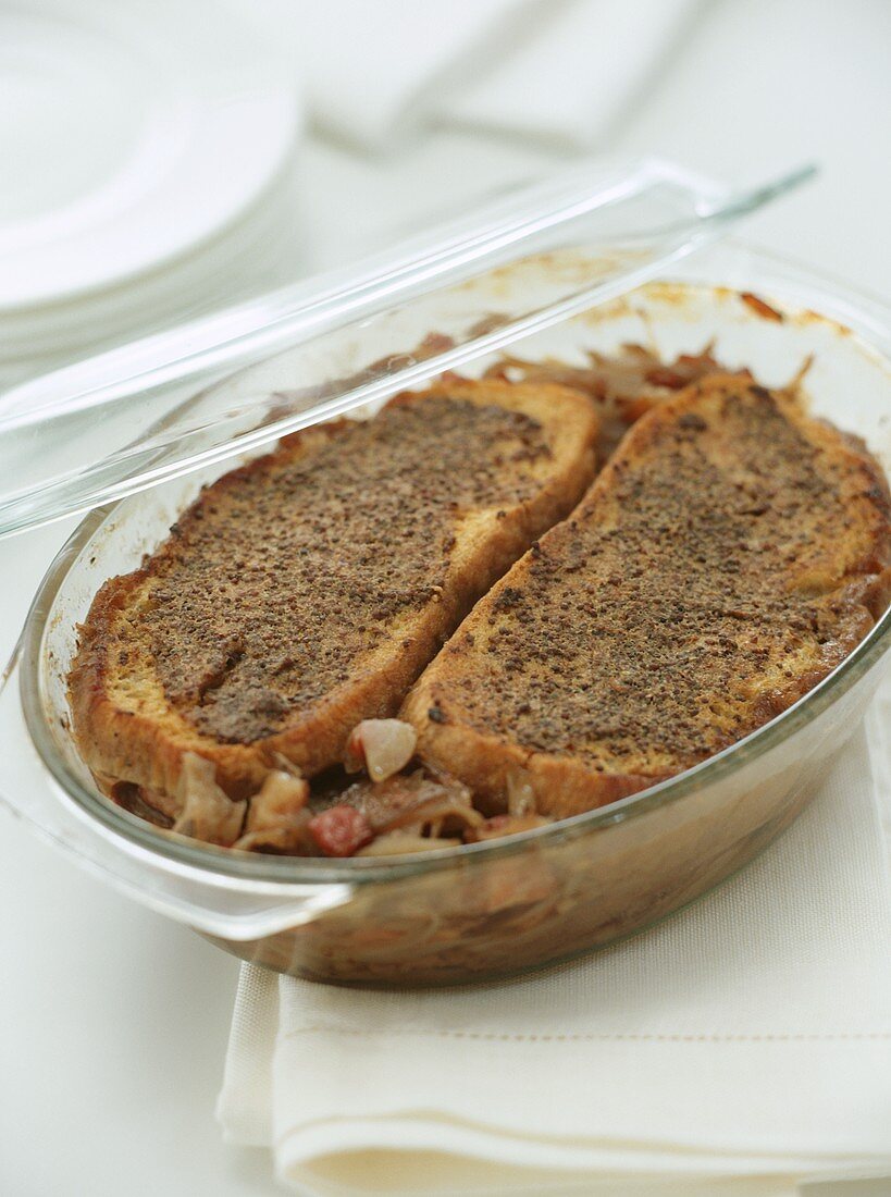 Bread pudding with beer, beef and bacon