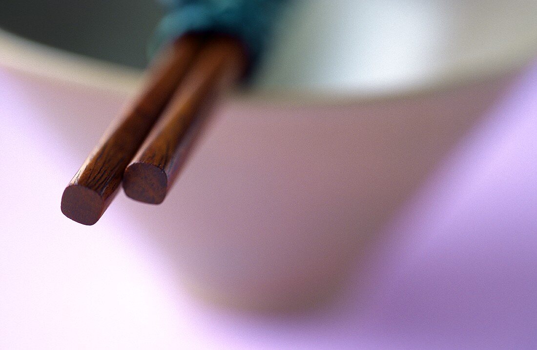 Chopsticks on bowl