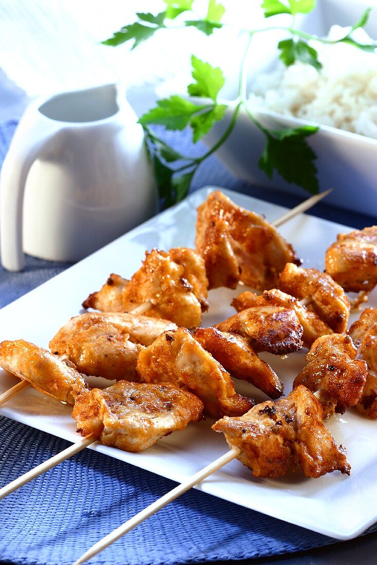 Chicken kebabs and rice