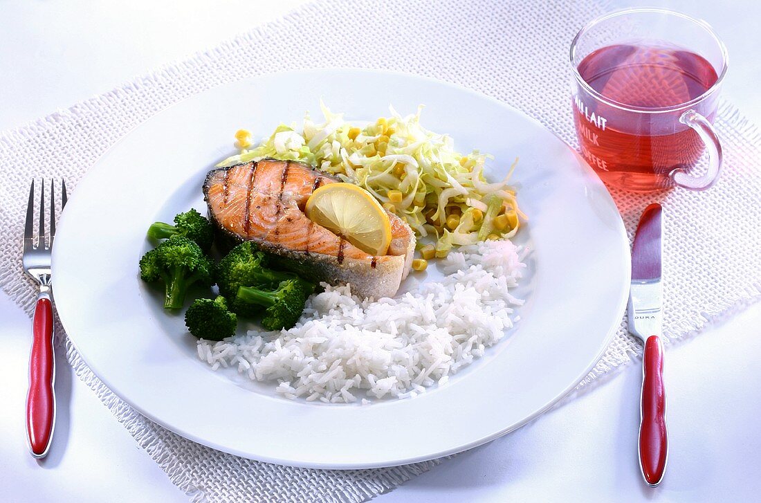 Grilled salmon cutlet with broccoli, leeks and rice