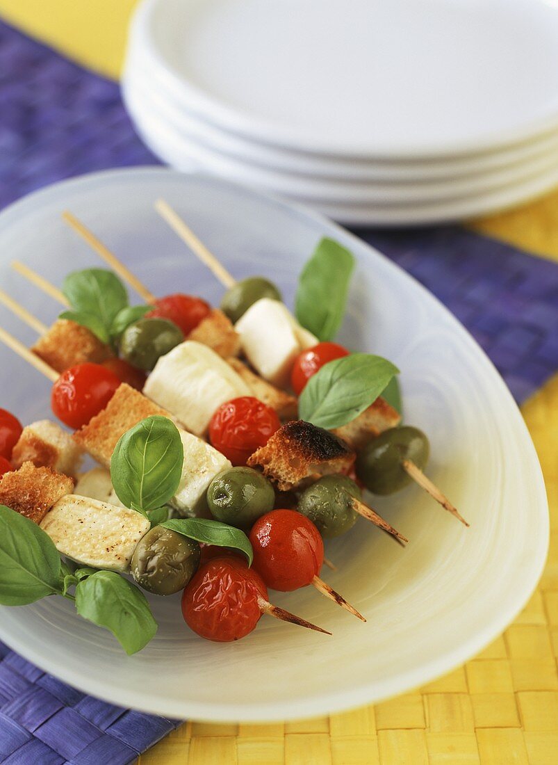 Mixed vegetable kebabs with cheese and croutons